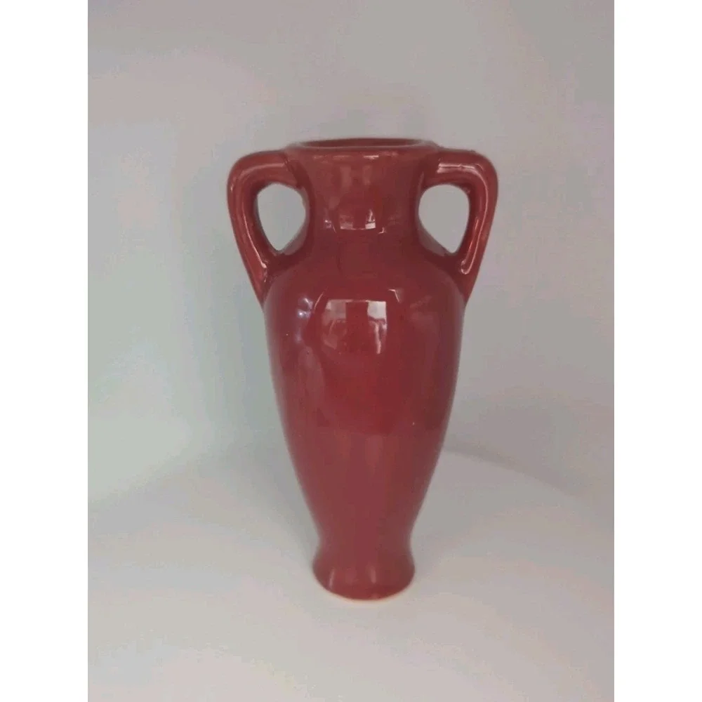Unmarked burgundy pottery
